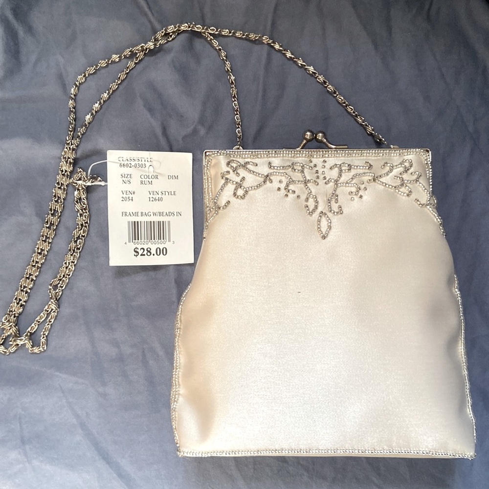 New with tags, David’s Bridal frame bag with beads